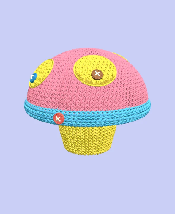 An original pink, yellow and blue knitted mushroom from Yarn Unravel
